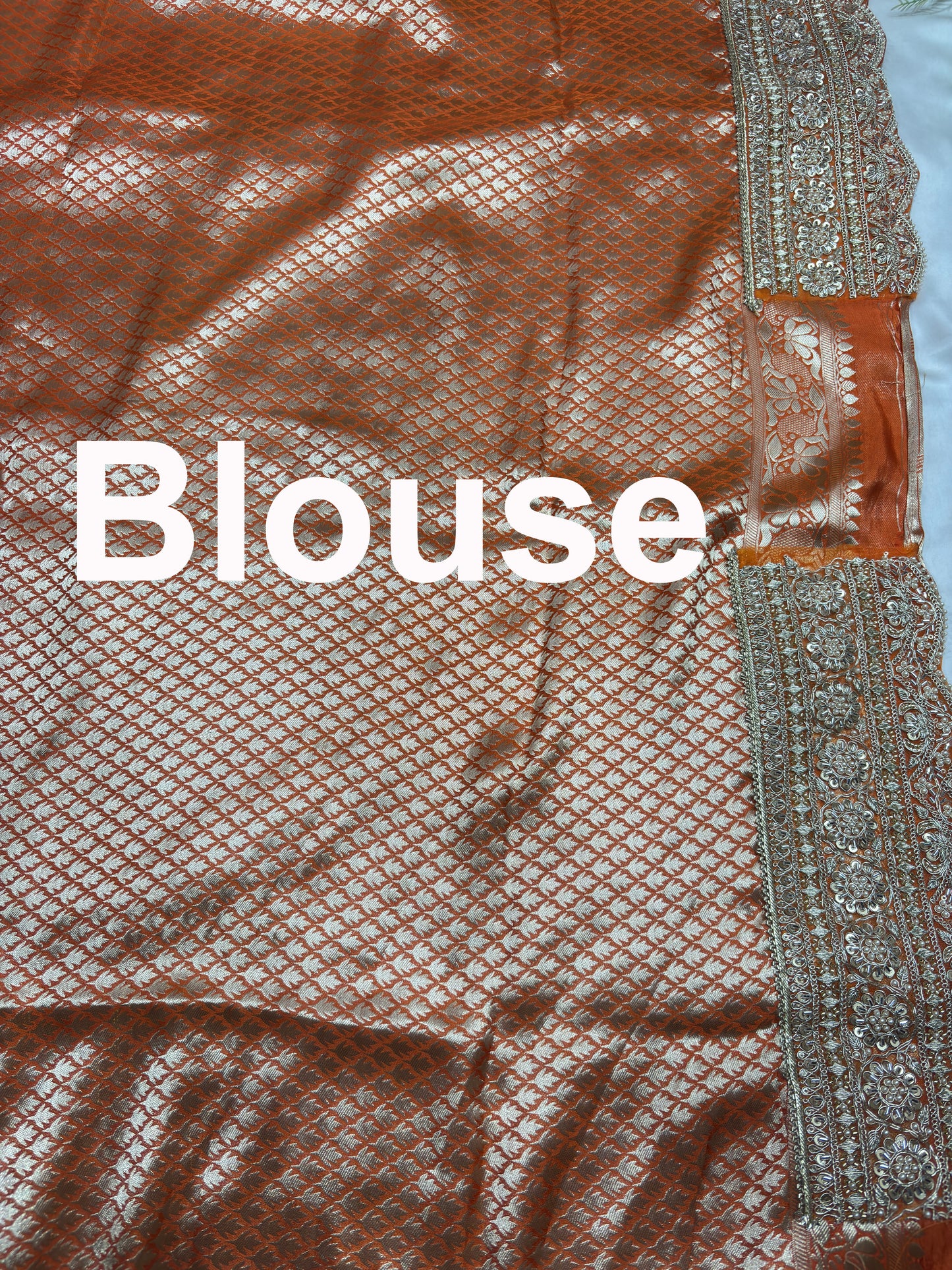 Luxury Orange Saree with Floral Weaving & Pearl Embroidered Border