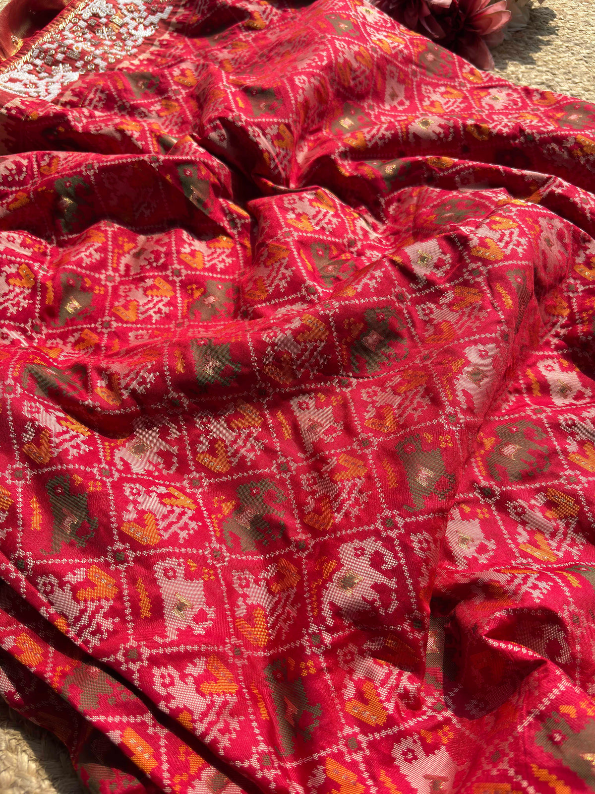 Red Patola Inspired Designer Saree with Golden Zari Style Border Work