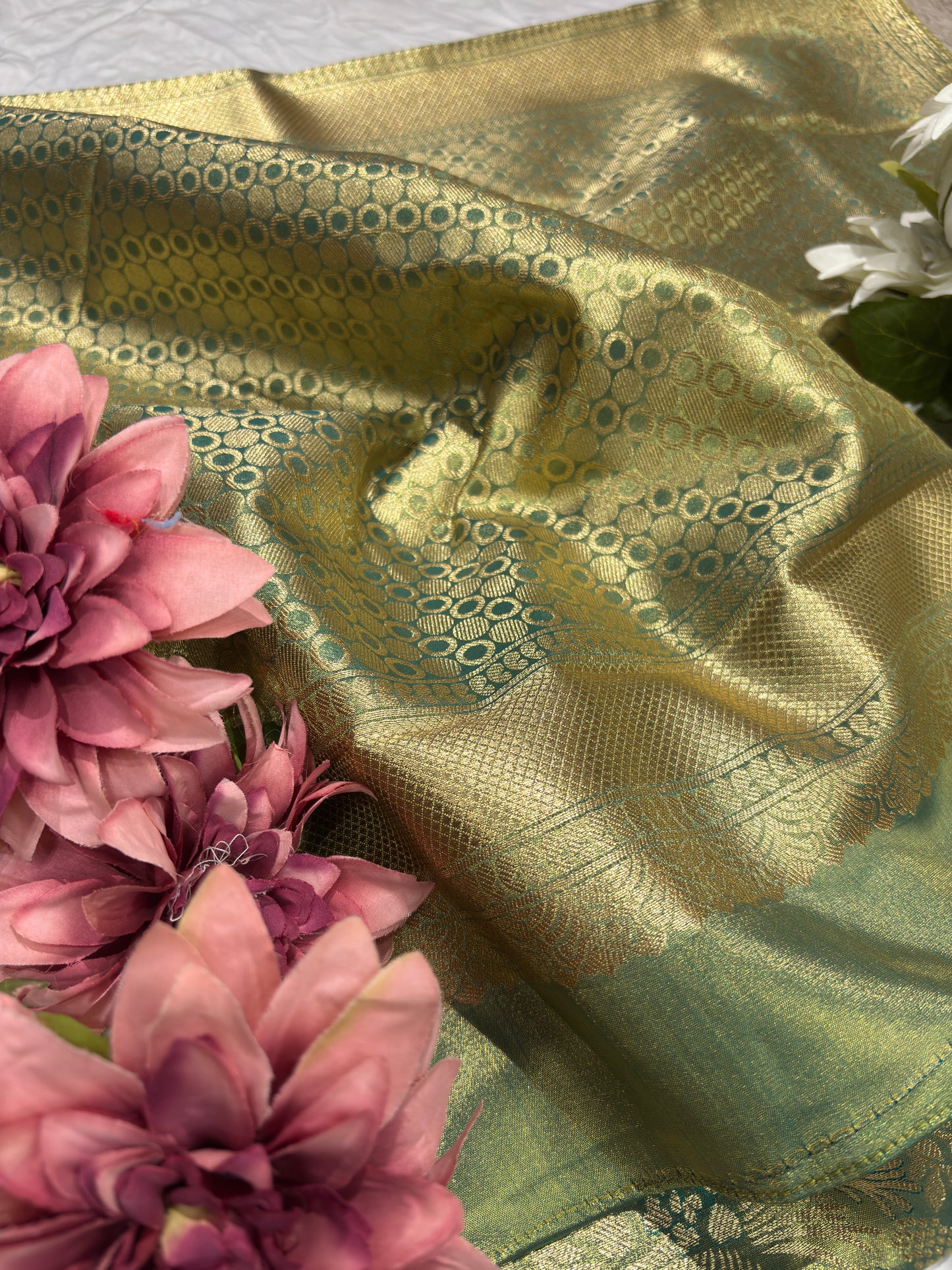 Green Kanchipuram Silk Saree with Floral Zari Weaving