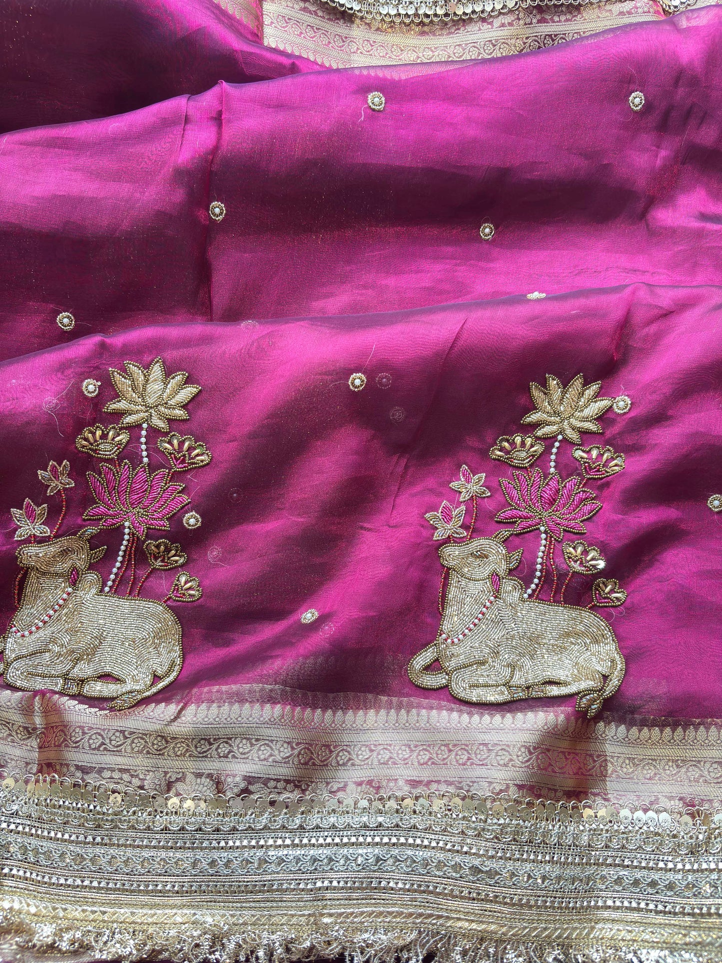 Magenta Nandi Motif Saree with Lotus Handwork & Ornate Gold Border