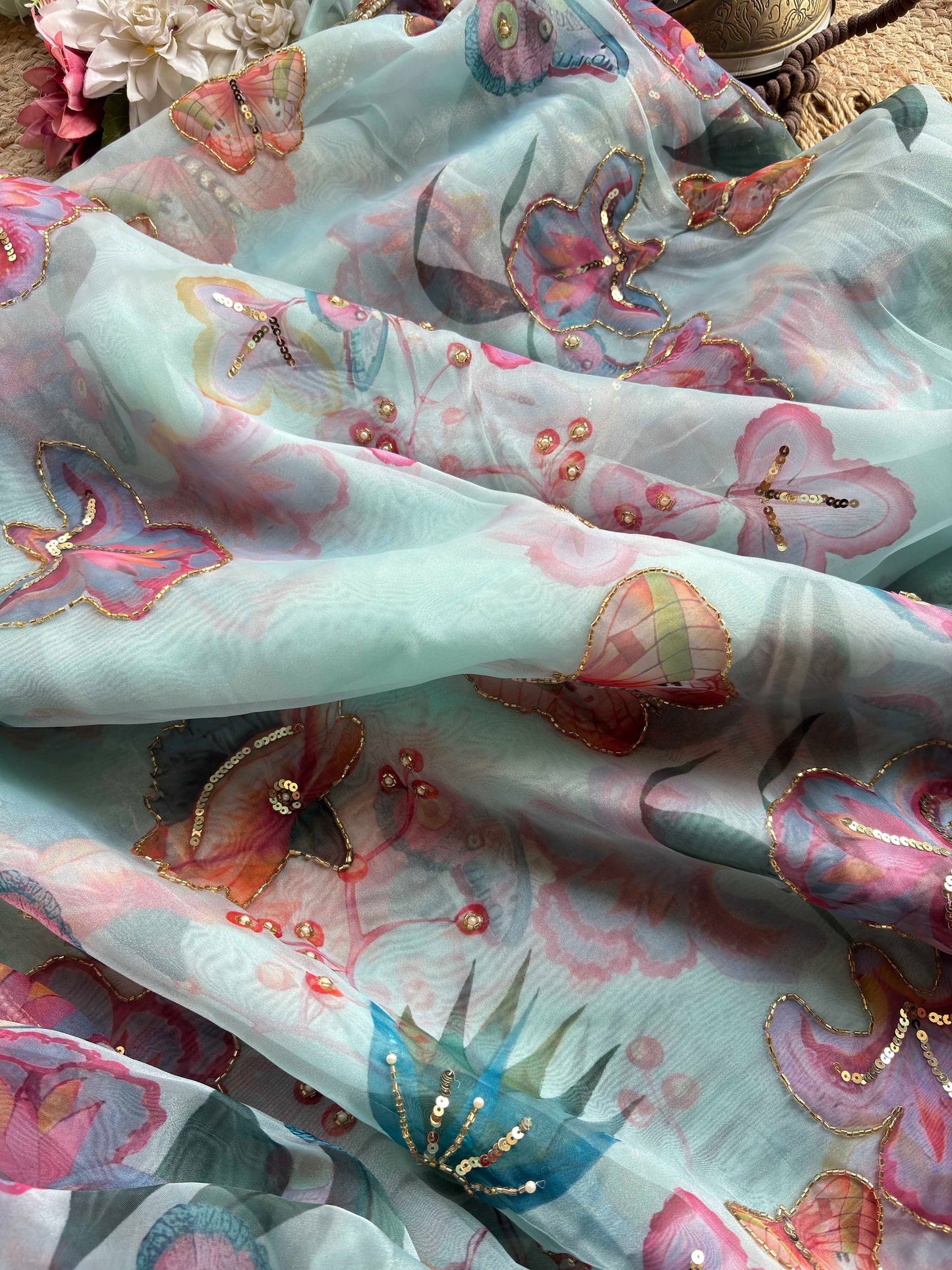Aqua Blue Floral Printed Organza Saree with Pearl & Sequin Border