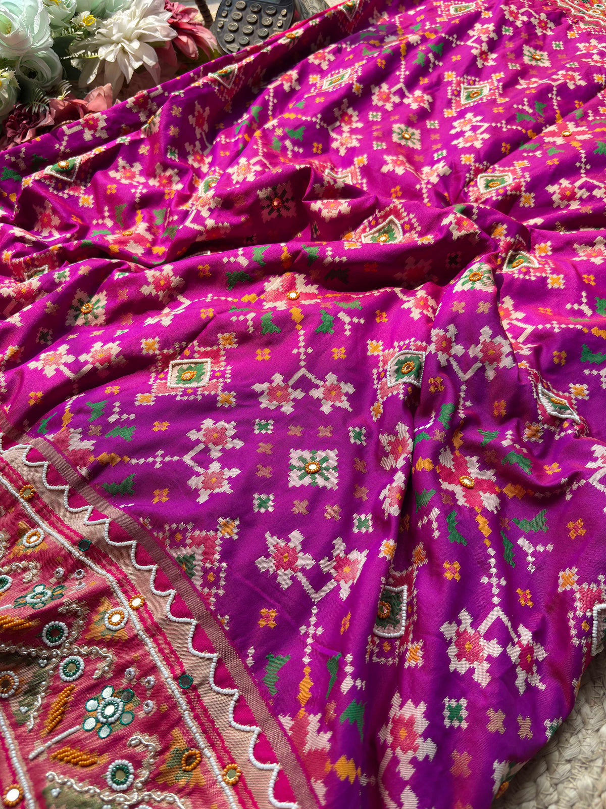 Magenta Patola Saree with Floral Motifs & Embellished Border