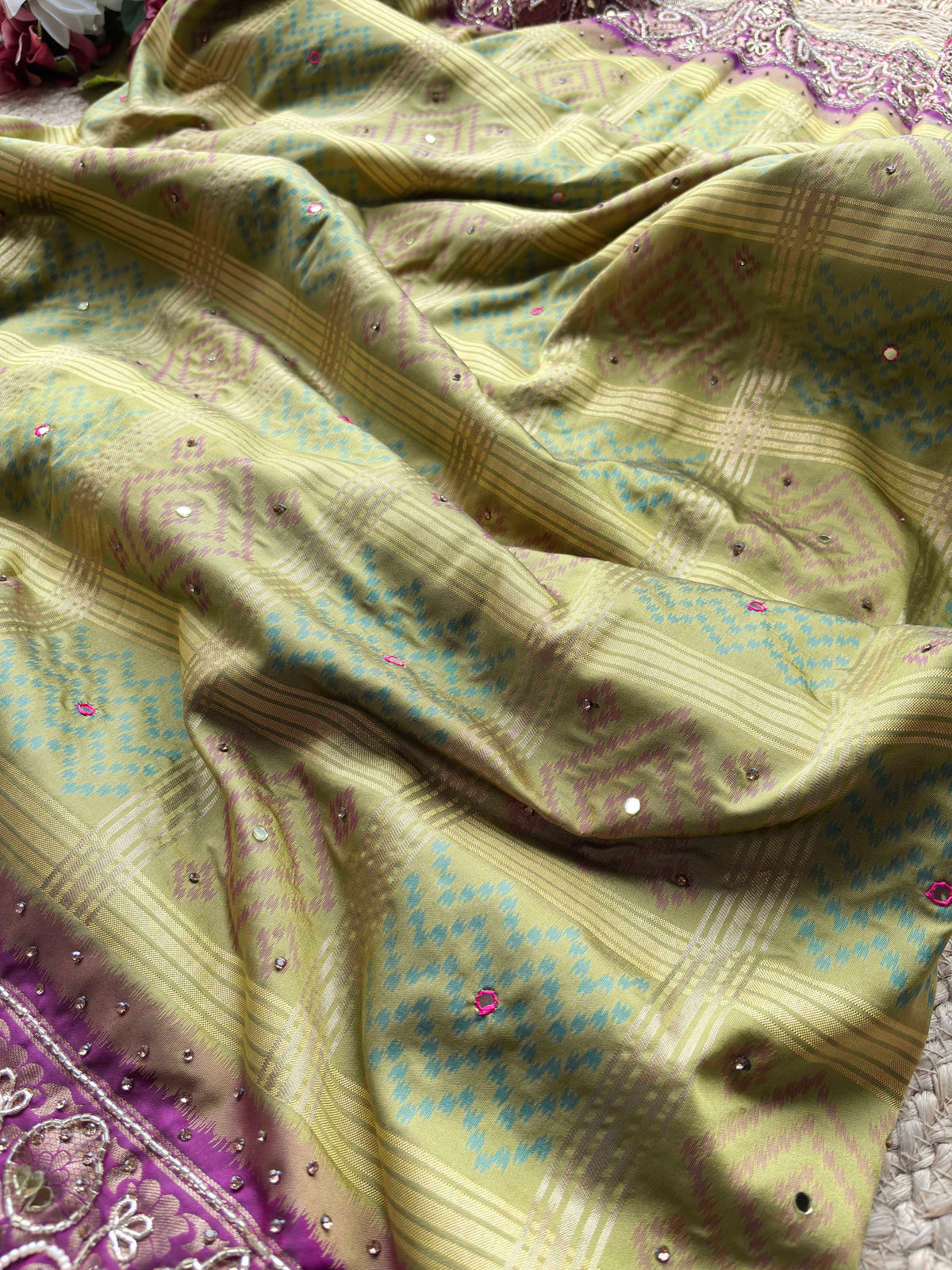 Olive Green Patola Saree with Purple Embellished Paisley Border
