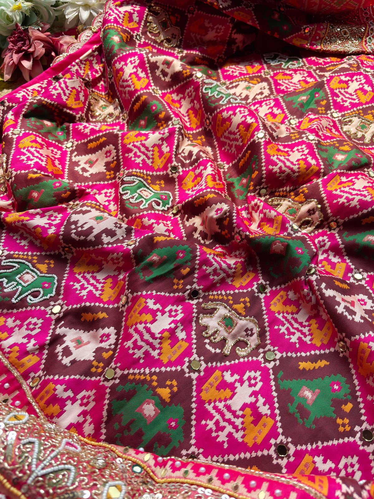 Rani Pink Patola Mirror Work Saree with Heavy Embellished Border