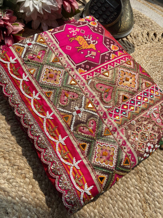 Rani Pink Patola Saree with Animal Motifs & Embellished Border
