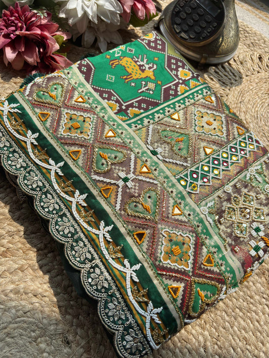 Green Patola Saree with Animal Motifs & Embellished Border