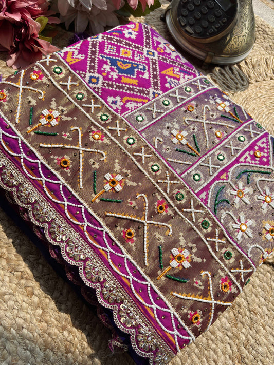 Magenta Patola Saree with Elephant Motifs & Embellished Border