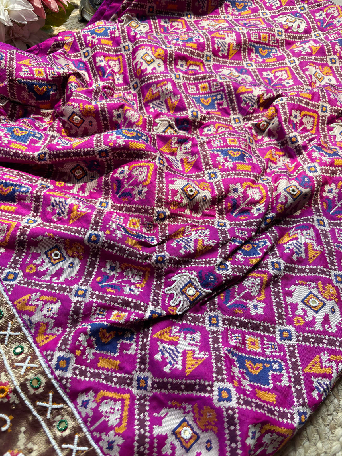 Magenta Patola Saree with Elephant Motifs & Embellished Border