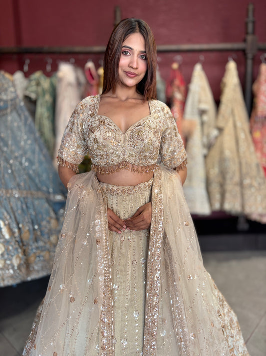 Ivory Champagne Heavy Embroidered Lehenga with Dupatta