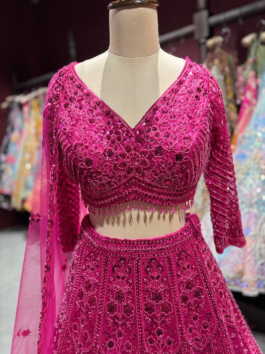 Rani Pink Heavy Embroidered Party Wear Lehenga Choli with Dupatta