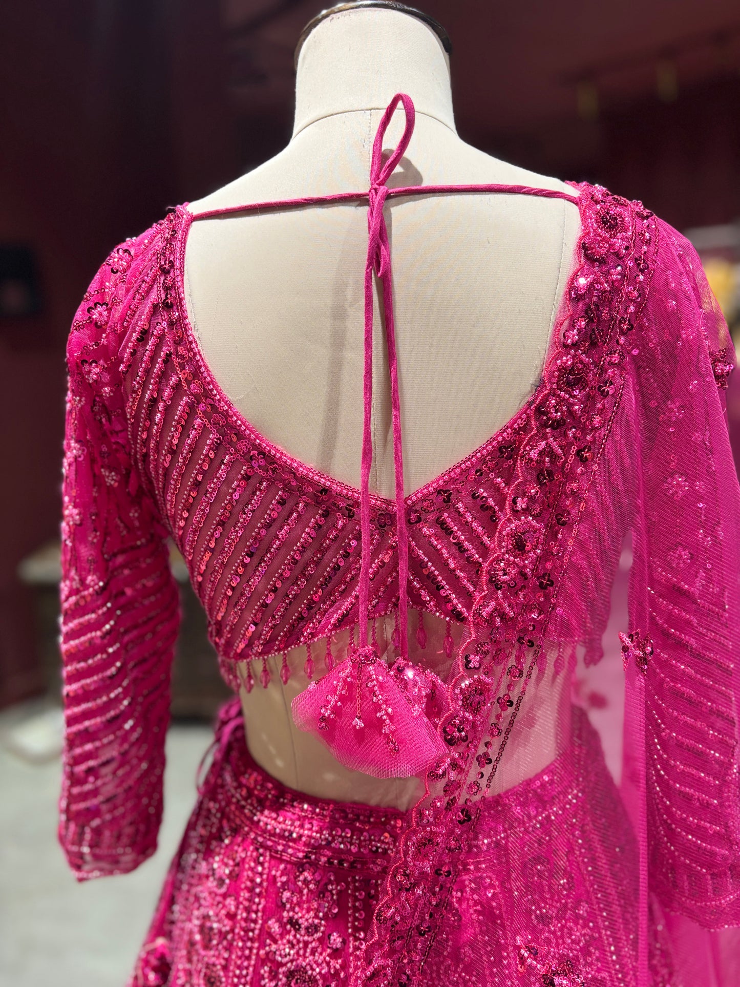 Rani Pink Heavy Embroidered Party Wear Lehenga Choli with Dupatta