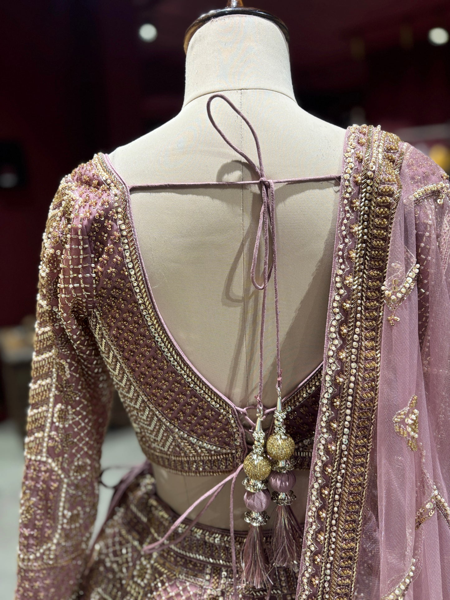 Dusty Rose Heavy Zari Embroidered Lehenga with Net Dupatta