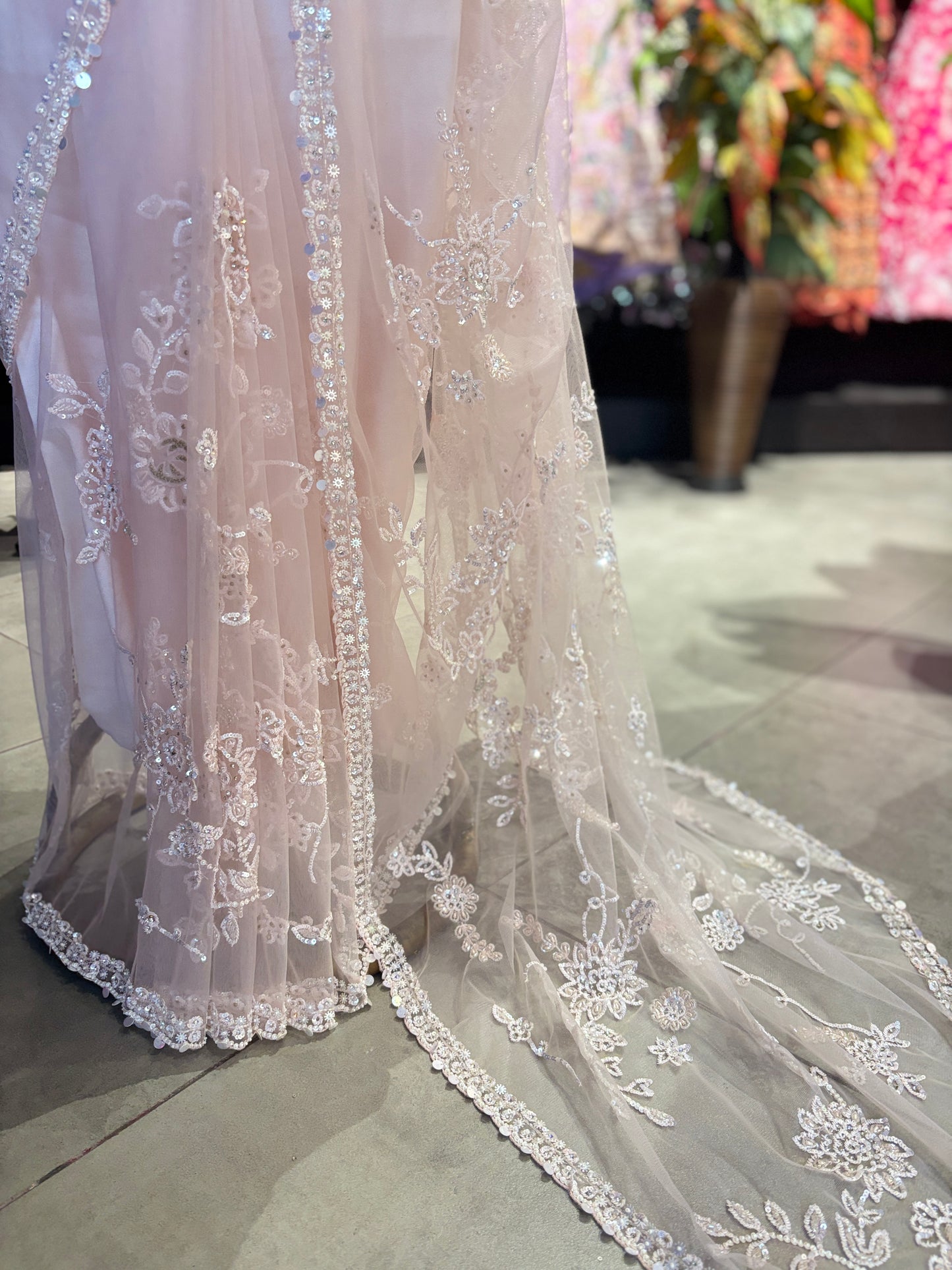 Pink Net Designer Saree with White Floral Embroidery and Pearl Border