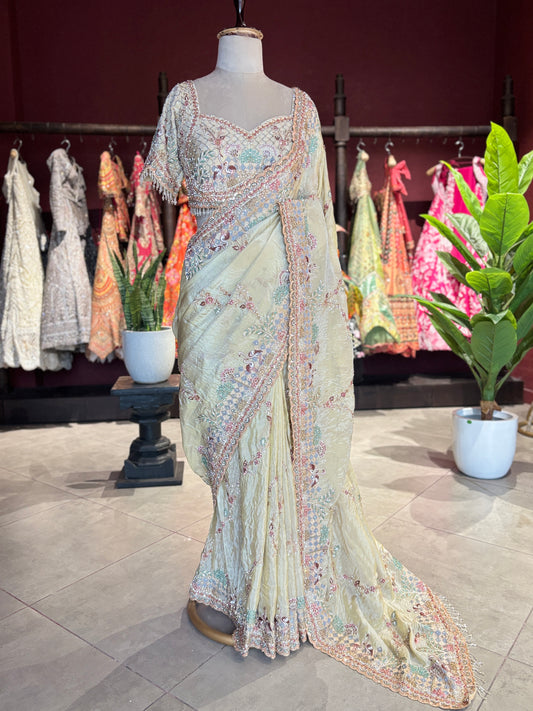 Pastel Yellow Designer Saree with Multicolor Embroidery & Heavy Border