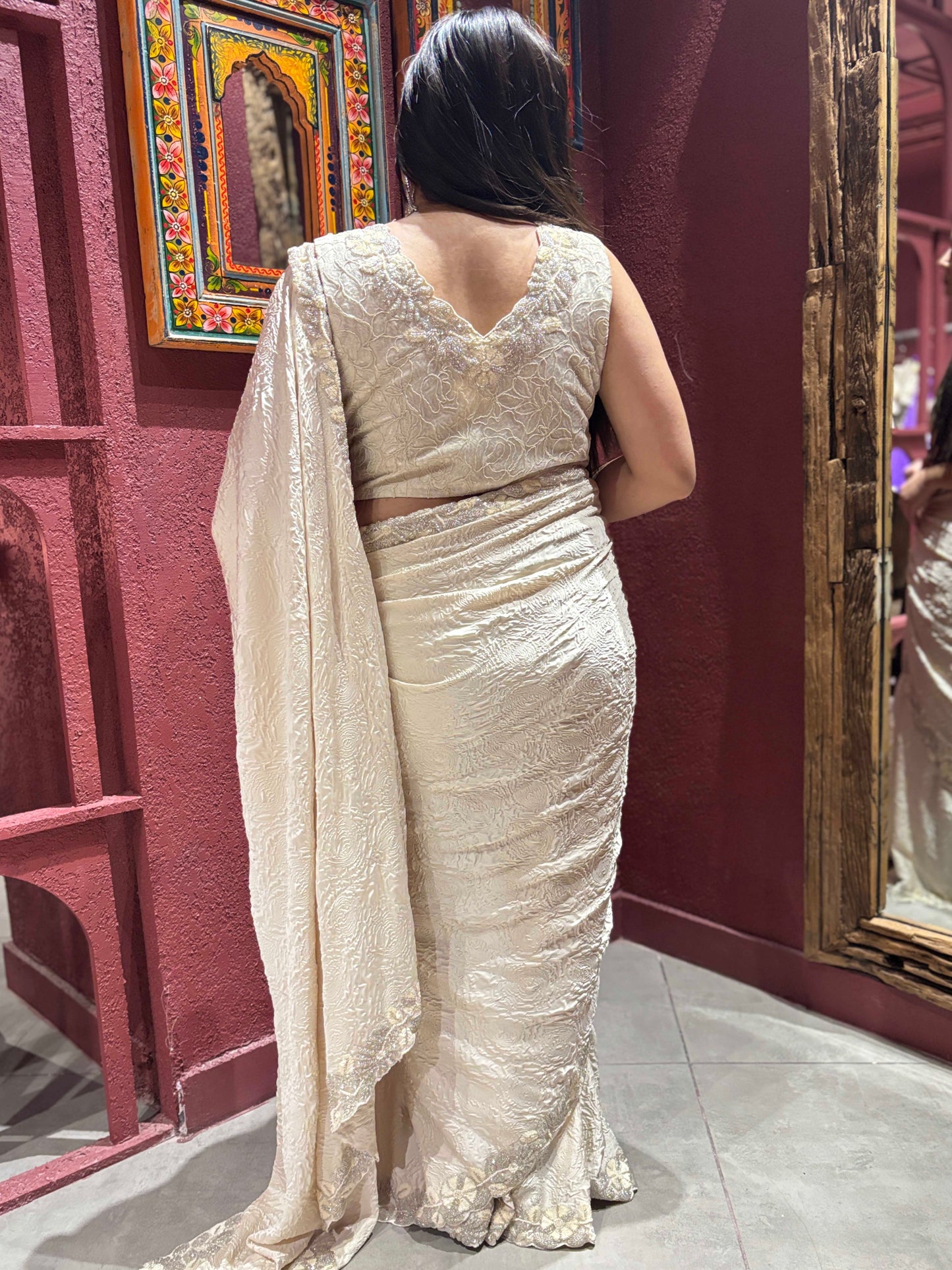 Ivory Self-textured Crepe Saree With Elegant Drape