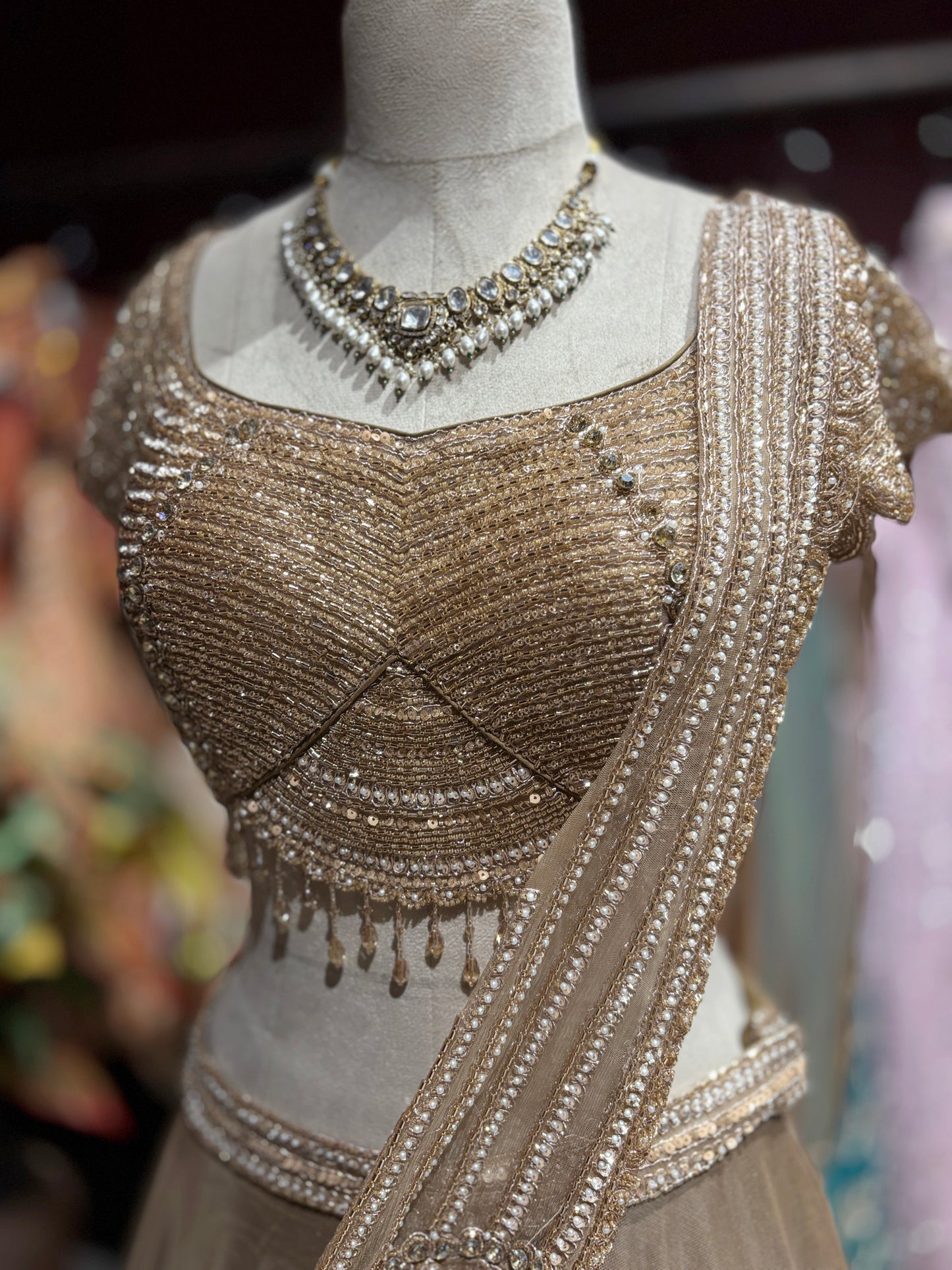 Champagne Gold Shimmer Draped Lehenga Set with Embellished Blouse
