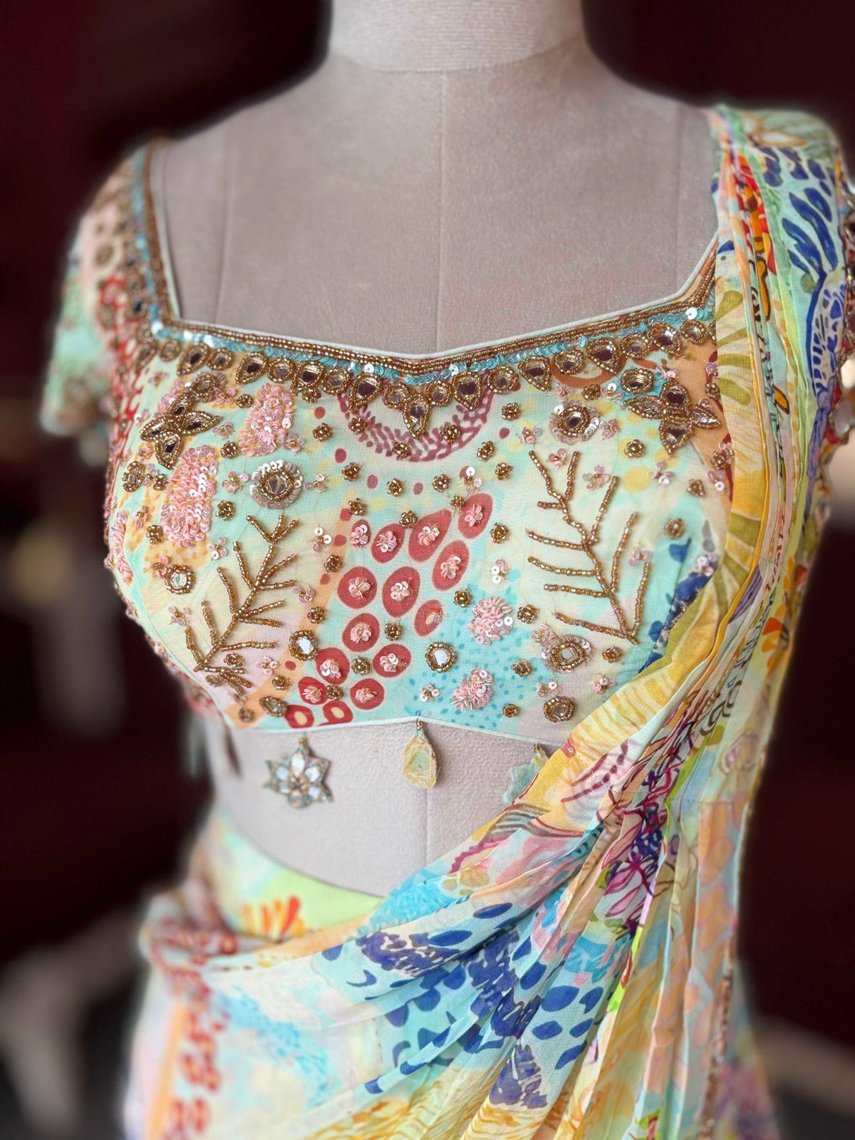 Pastel Multicolor Printed Draped Saree with Embellished Blouse