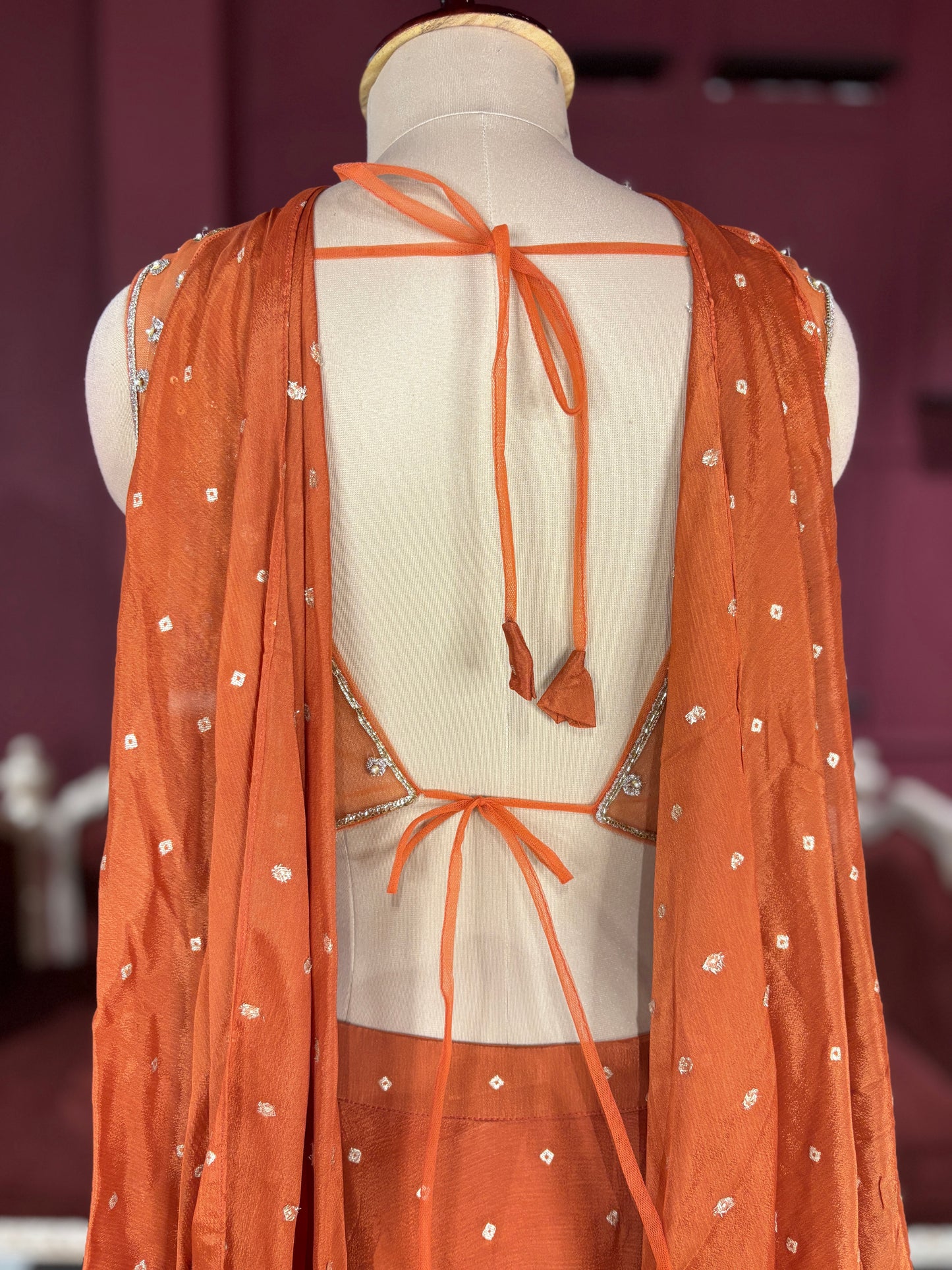 Designer Chinon Orange Lehenga with Embroidered Sleeveless Blouse