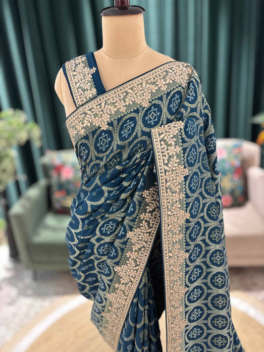 Teal Blue Printed Saree with Heavy Hand Embroidered Border