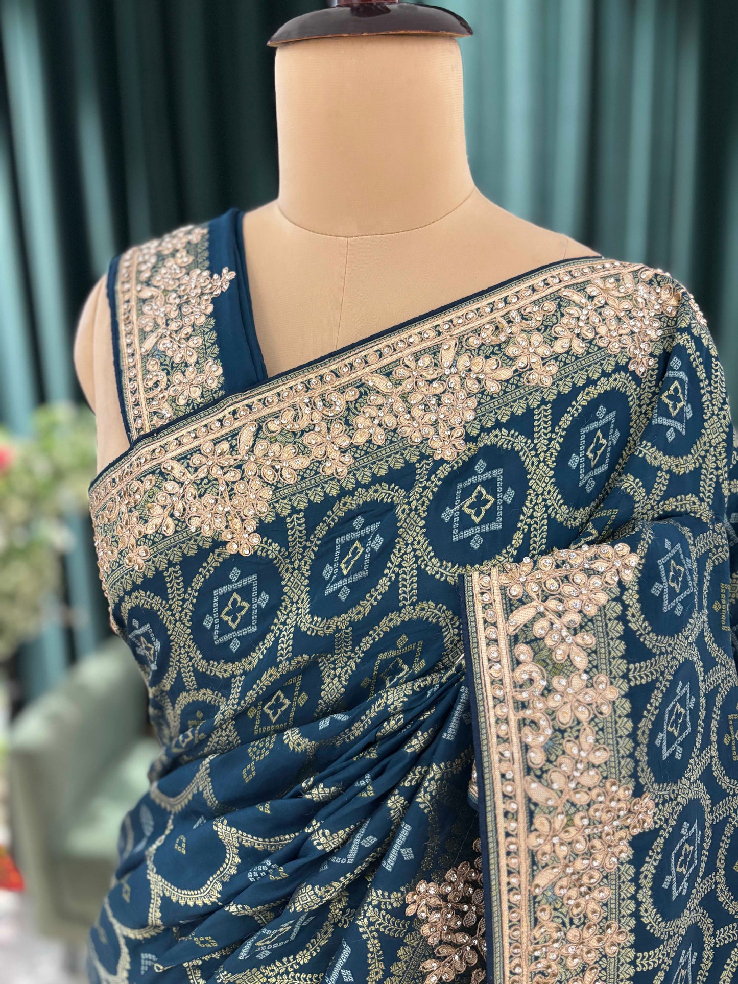 Teal Blue Printed Saree with Heavy Hand Embroidered Border