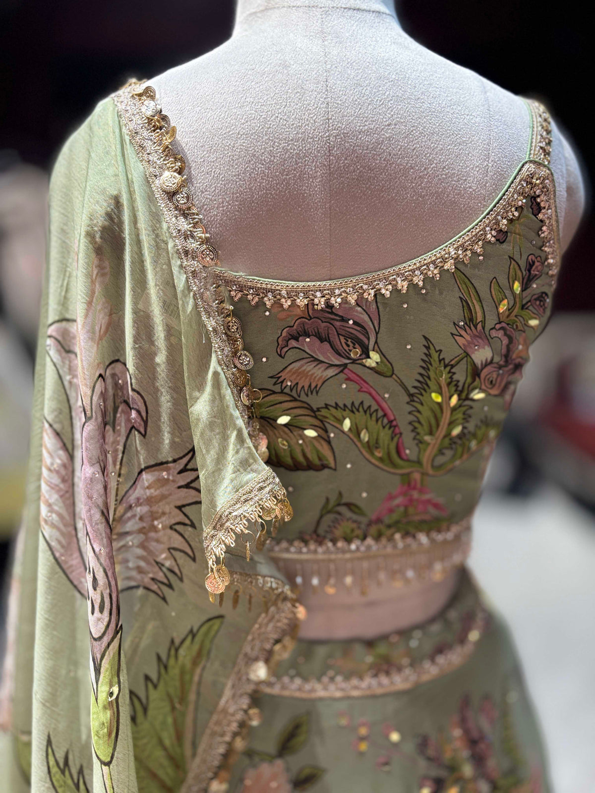 Pastel Green Floral Printed Lehenga with Embellished Blouse & Dupatta