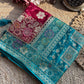 Wine & Teal Banarasi Silk Saree with Floral Zari Weaving