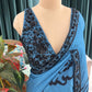 Blue Floral Print Saree with Black Embroidered Border Design
