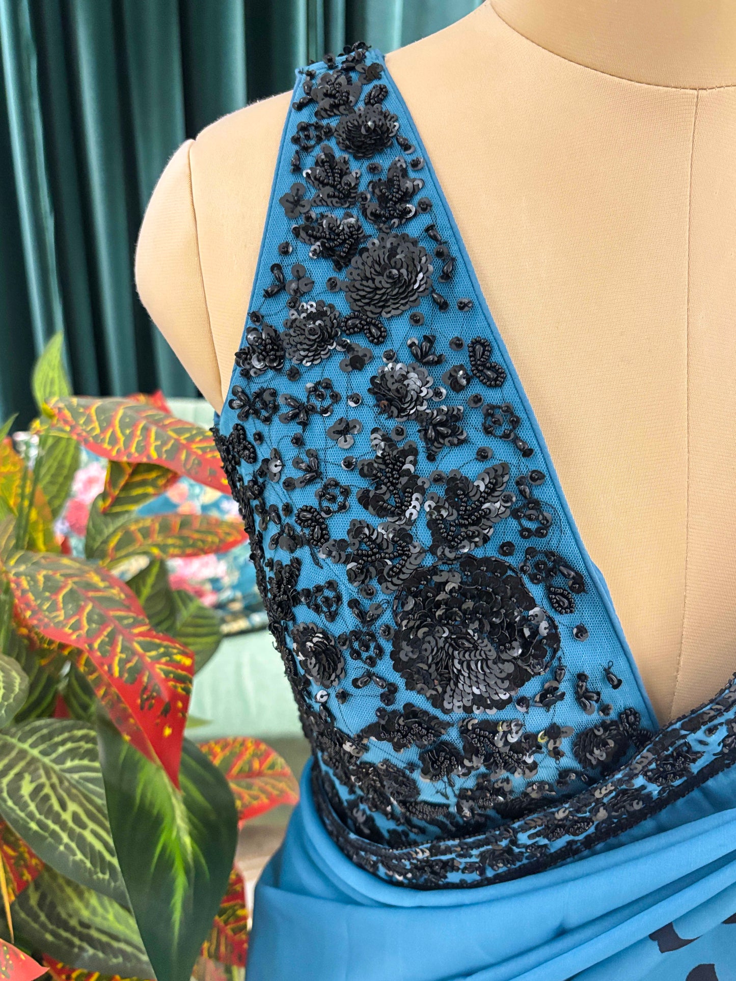 Blue Floral Print Saree with Black Embroidered Border Design