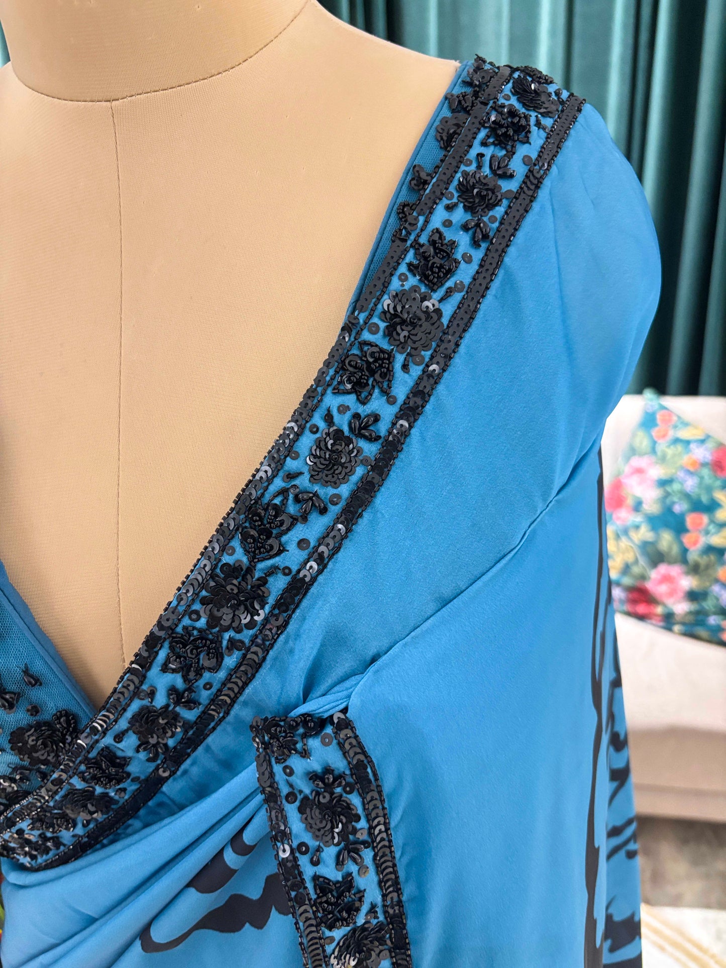 Blue Floral Print Saree with Black Embroidered Border Design