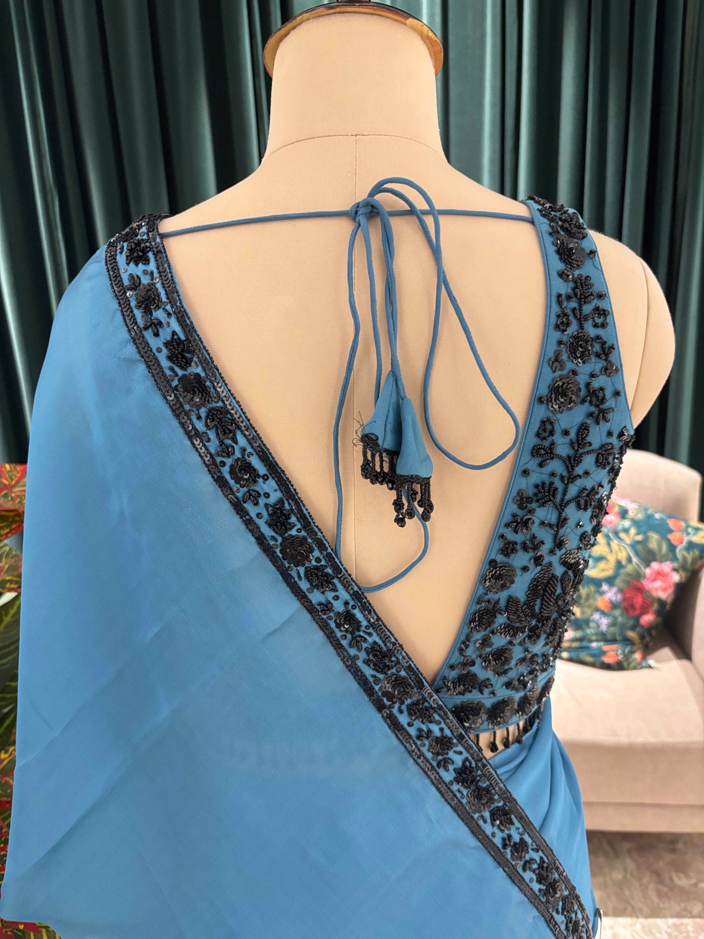 Blue Floral Print Saree with Black Embroidered Border Design