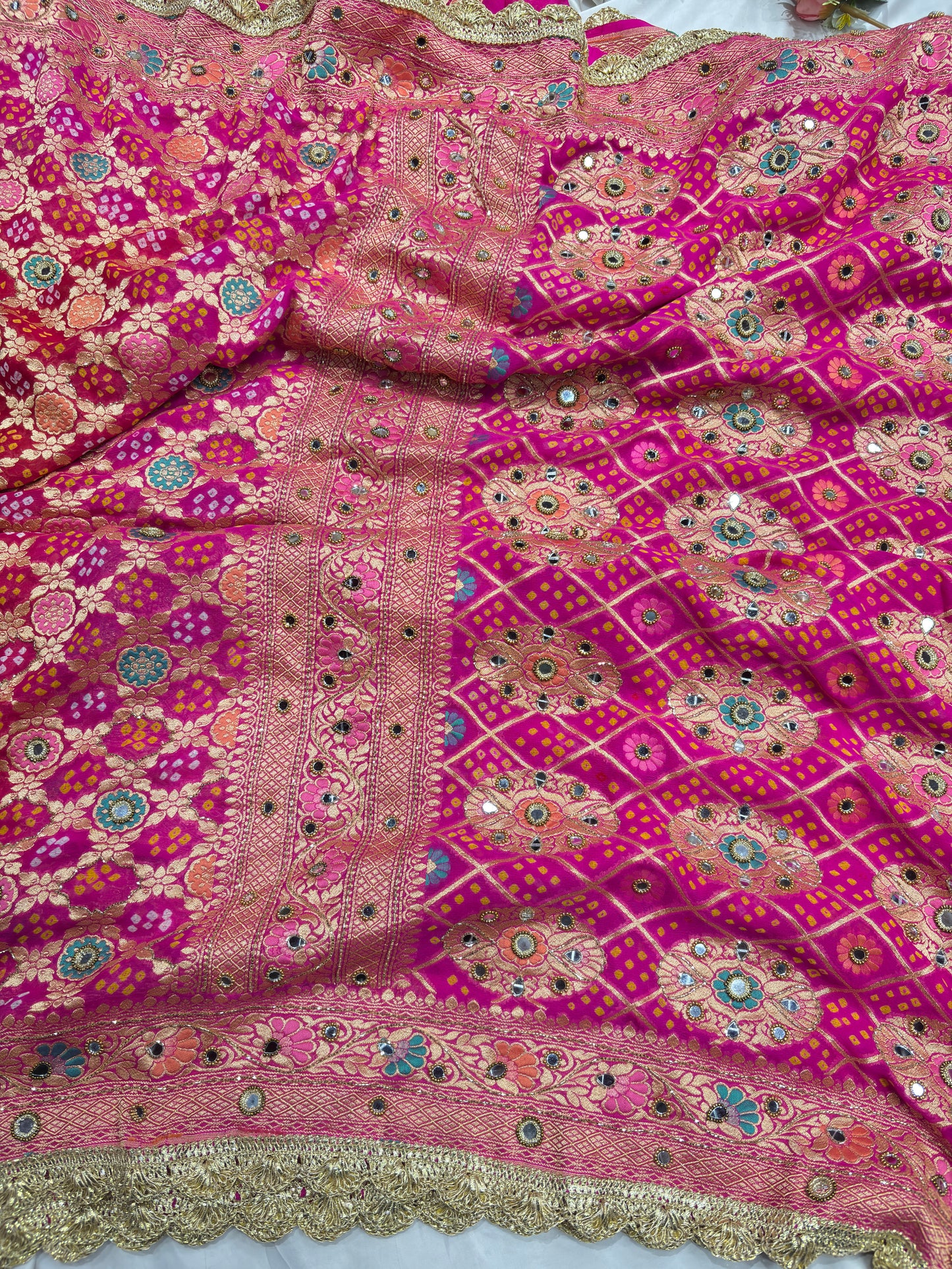 Rani Pink Khaddi Georgette Saree with Floral Weaving Mirror Work
