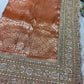 Luxury Orange Saree with Floral Weaving & Pearl Embroidered Border