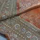 Luxury Orange Saree with Floral Weaving & Pearl Embroidered Border