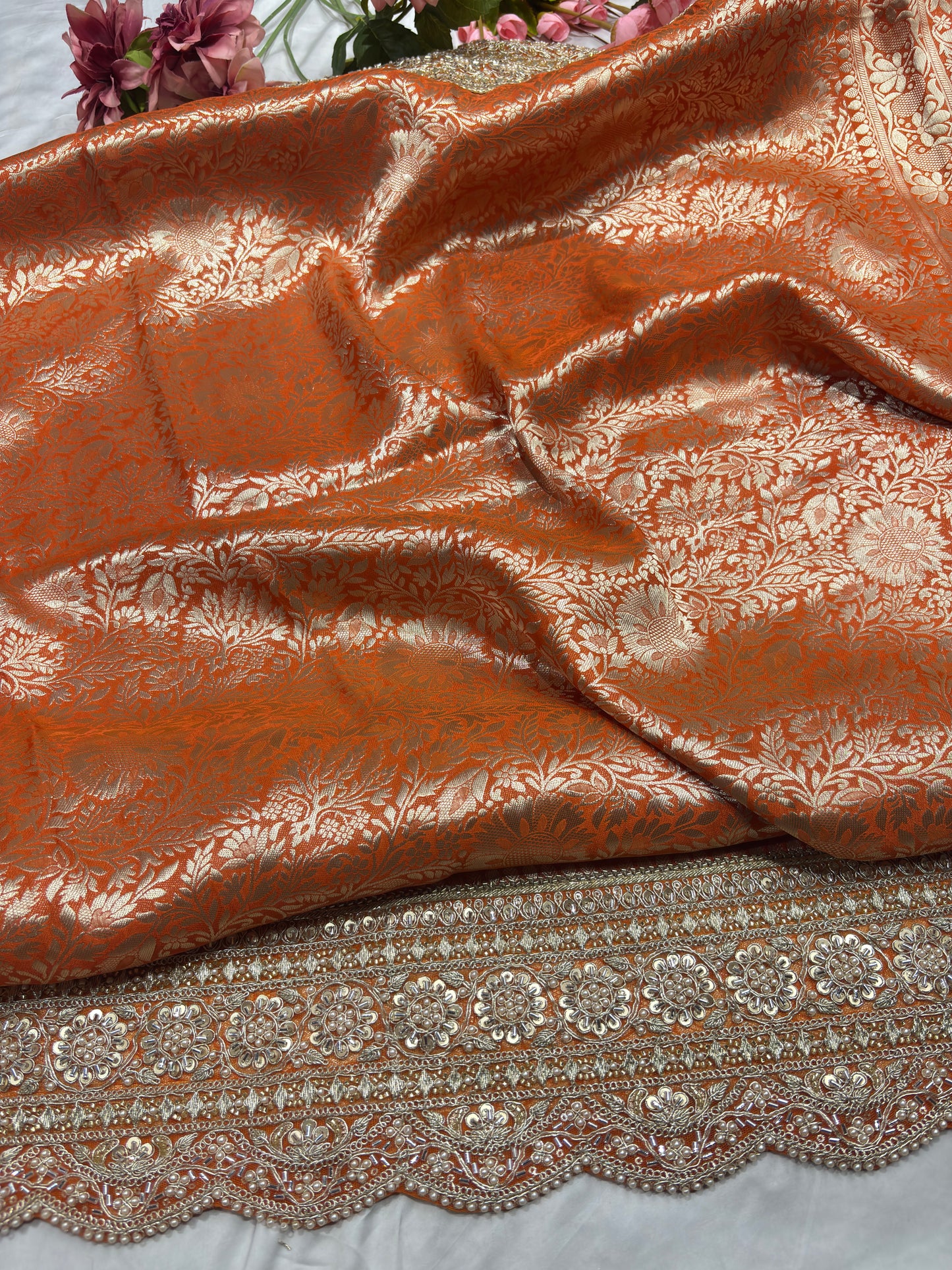 Luxury Orange Saree with Floral Weaving & Pearl Embroidered Border