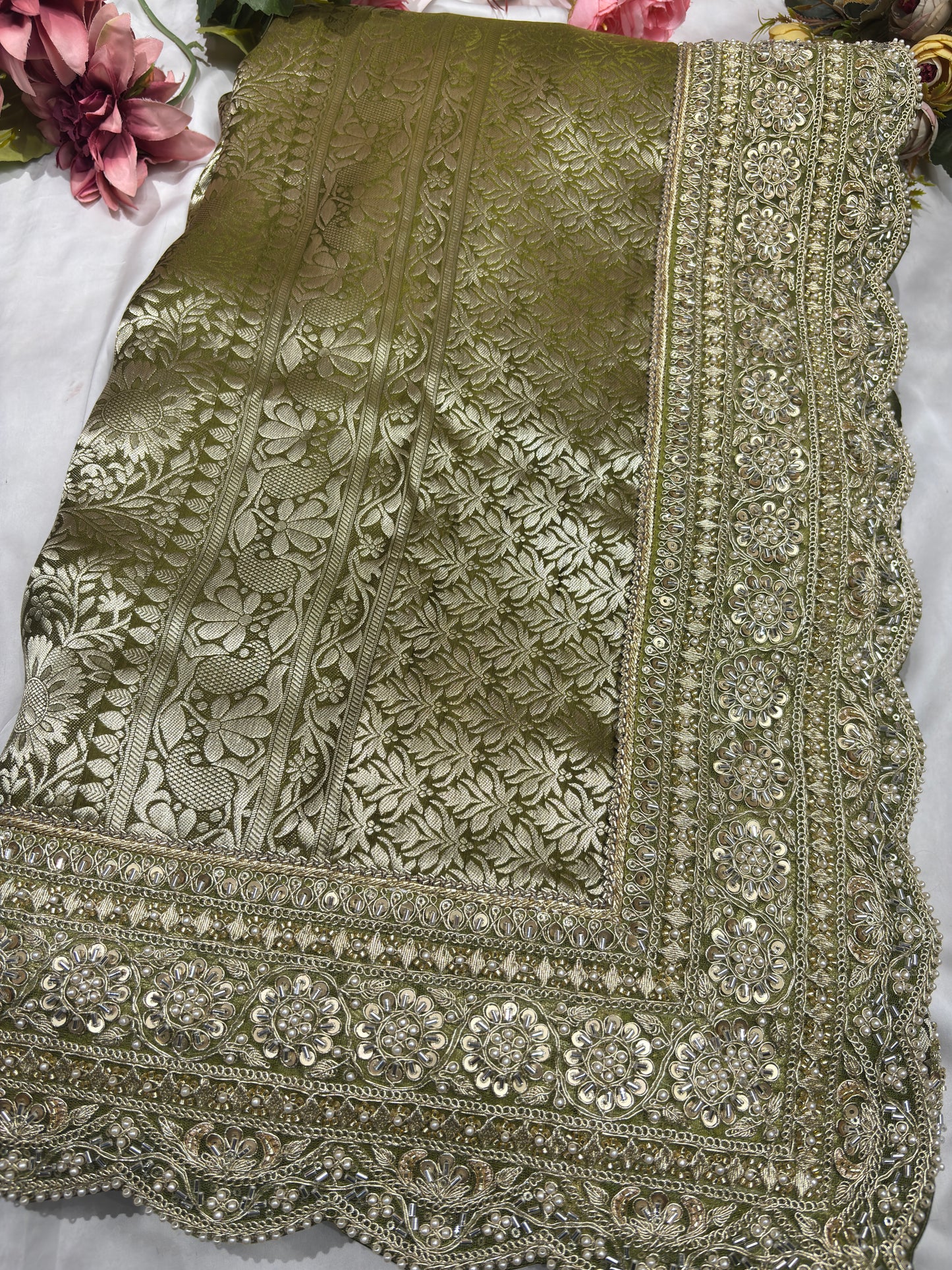 Luxury Green Saree with Floral Weaving & Pearl Embroidered Border