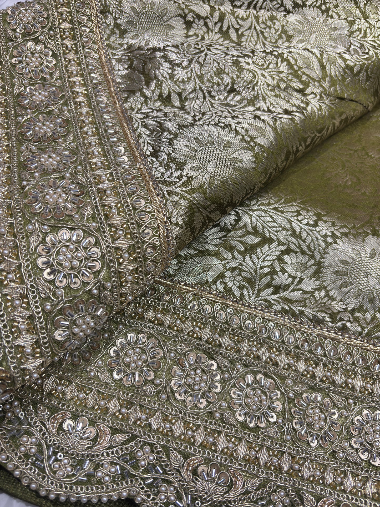 Luxury Green Saree with Floral Weaving & Pearl Embroidered Border
