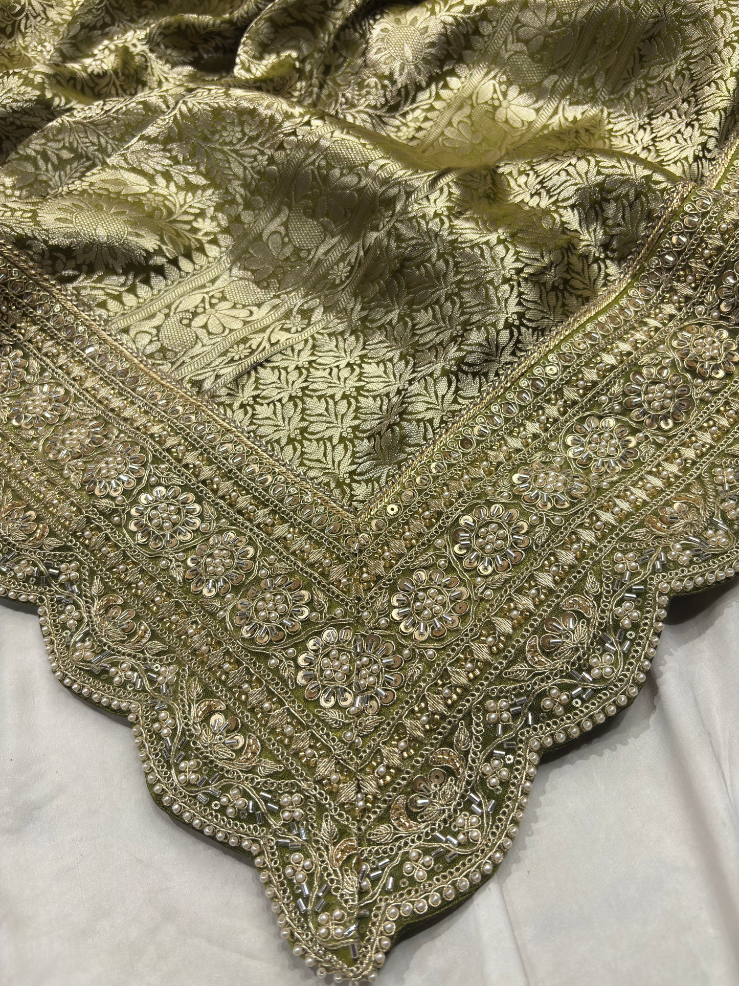 Luxury Green Saree with Floral Weaving & Pearl Embroidered Border