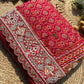 Royal Red Patola-Inspired Designer Saree with Intricate Beadwork, Traditional Motifs and Scalloped Lace Border