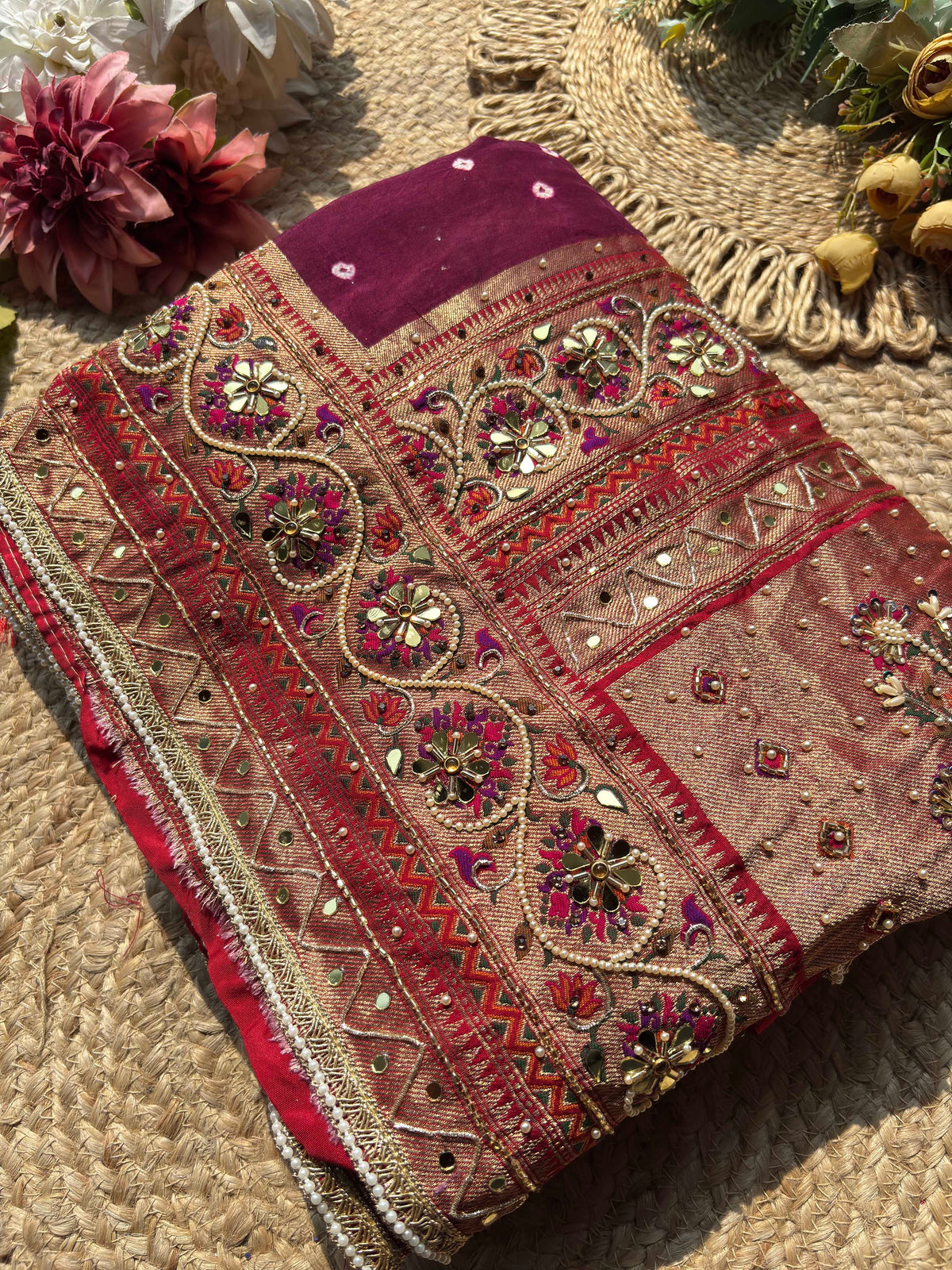 Royal Wine Maroon Designer Saree with Rich Golden Zari Border, Floral Mirror Work, Pearl Beadwork and Traditional Embroidery