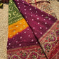 Royal Wine Maroon Designer Saree with Rich Golden Zari Border, Floral Mirror Work, Pearl Beadwork and Traditional Embroidery