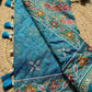 Royal Teal Blue Designer Saree with Multicolour Floral Embroidery, Mirror Work, Pearl Beadwork, Scalloped Lace Border and Tassel Detailing
