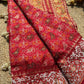 Royal Red Patola-Inspired Designer Saree with Golden Zari-Style Border, Multicolour Floral Motifs, Intricate White Beadwork and Pearl Tassel Detailing