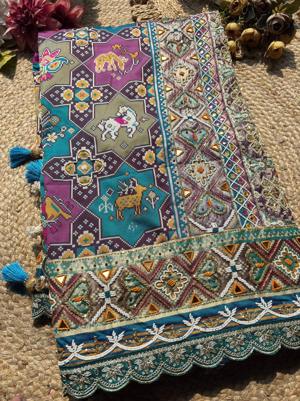 Royal Teal Blue Multicolour Patola-Inspired Designer Saree with Bird Motifs, Floral Embroidery, Mirror Work, Pearl Beadwork and Scalloped Lace Border