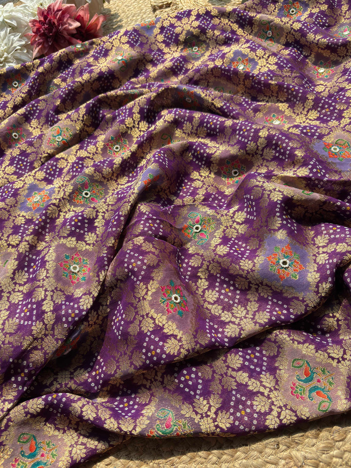 Royal Purple Gold Zari Designer Saree with Traditional Floral Motifs, Intricate Paisley Embroidery, Pearl Beadwork, Mirror Accents and Scalloped Lace Border