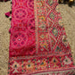 Rani Pink Bandhani Designer Saree with Traditional Elephant Motifs, Intricate Pearl Beadwork, Mirror Embellishments, Gold Zari Detailing and Scalloped Lace Border