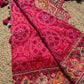 Rani Pink Bandhani Designer Saree with Traditional Elephant Motifs, Intricate Pearl Beadwork, Mirror Embellishments, Gold Zari Detailing and Scalloped Lace Border