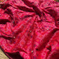 Rani Pink Bandhani Designer Saree with Traditional Elephant Motifs, Intricate Pearl Beadwork, Mirror Embellishments, Gold Zari Detailing and Scalloped Lace Border