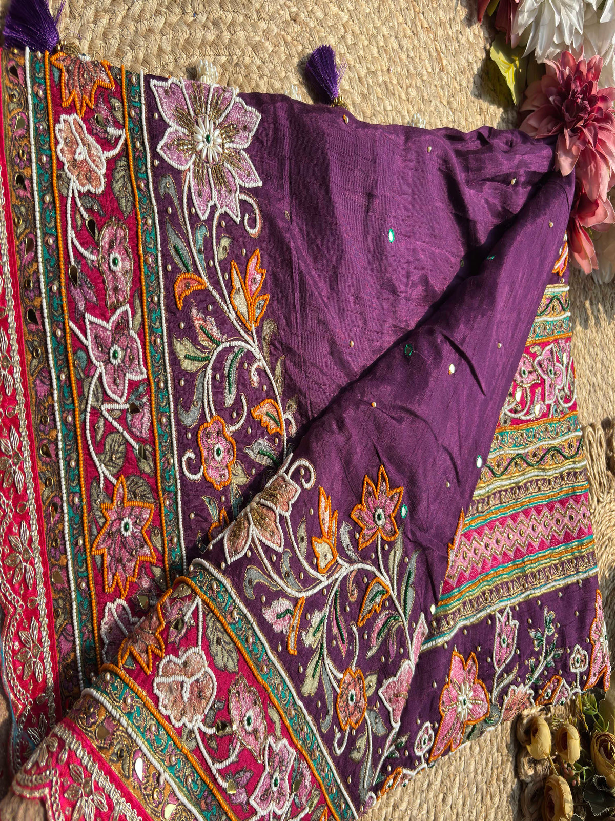 Royal Plum Purple and Rani Pink Designer Saree with Intricate Floral Embroidery, Pearl Beadwork, Mirror Embellishments, Multicolour Threadwork and Scalloped Gold Lace Border