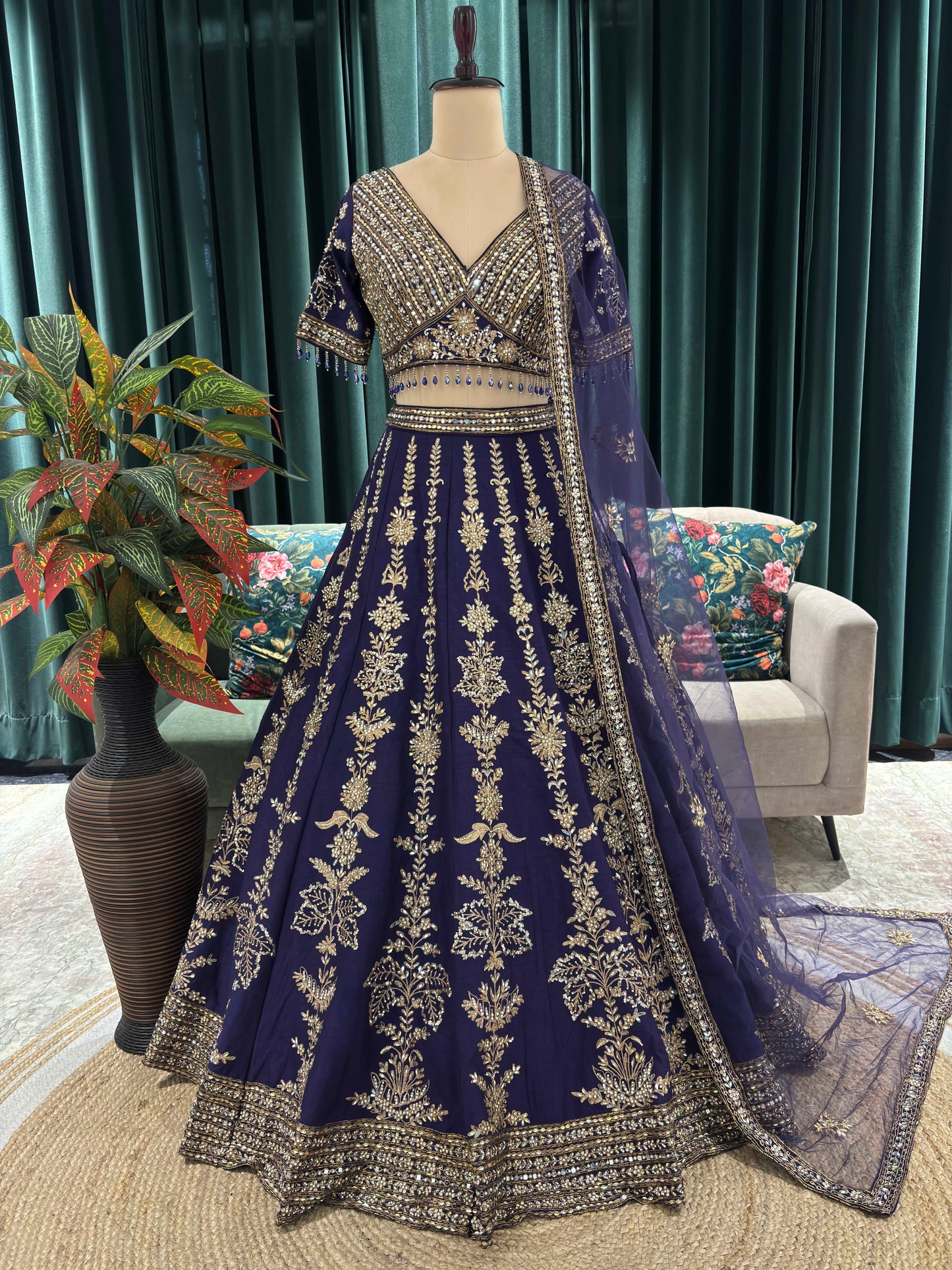 Regal Embroidered Lehenga with Intricate Gold Detailing