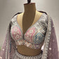 The Powder-Purple Colour Lehanga with Sequnis and Zari Work